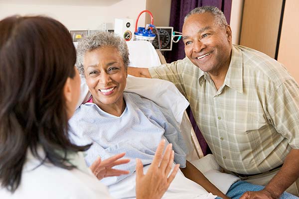 Stroke physician consults with patient and family Stroke physician consults with patient and family